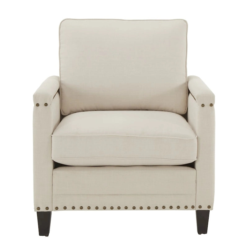Chaise en tissu ivoire avec garniture cloutée