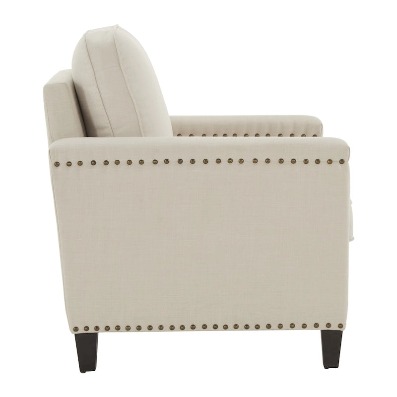 Chaise en tissu ivoire avec garniture cloutée